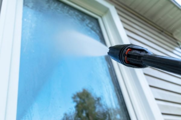 Cleaning,Service,Washing,Building,Facade,And,Window,With,Pressure,Water.